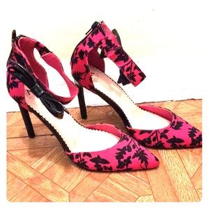Pink and black heel with ankle strap